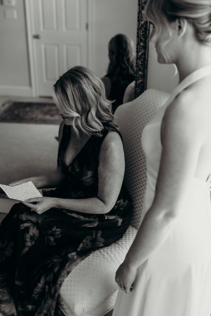 bride and mom reading a letter