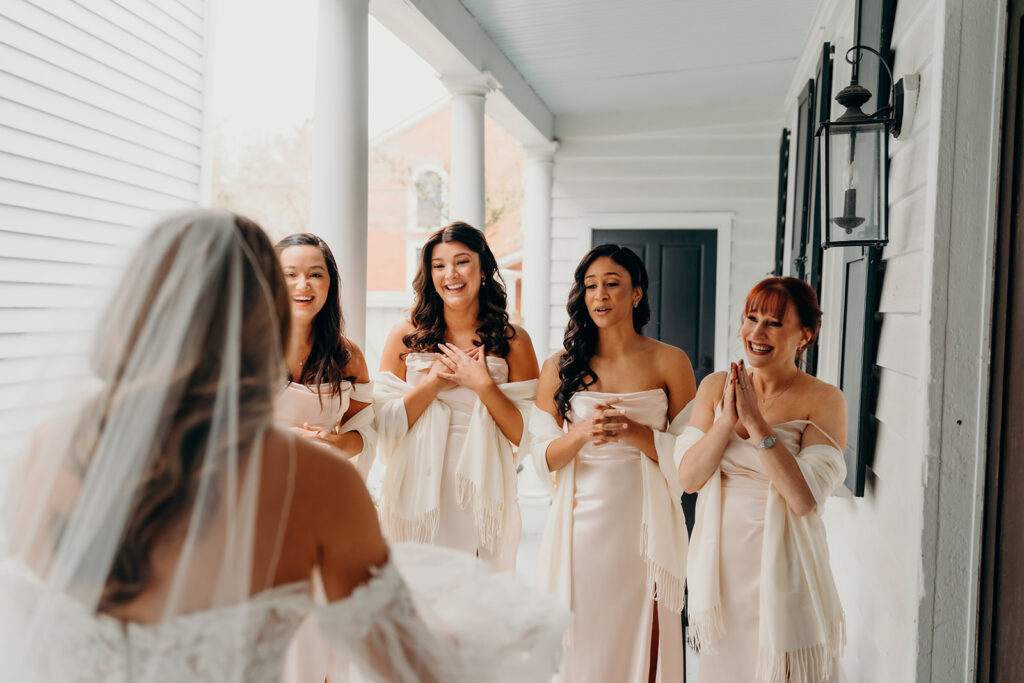 bride surprising bridesmaids