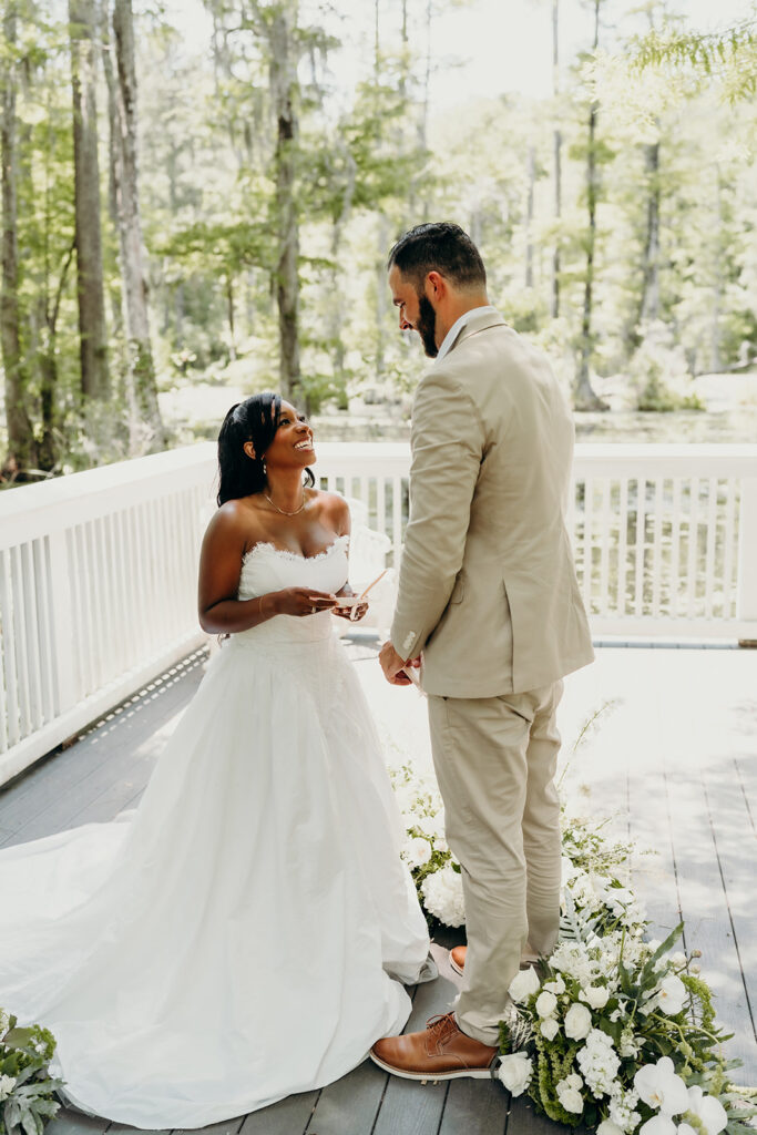 Romantic Elopement at Cypress Gardens - Ceremony by the dock exchanging vows