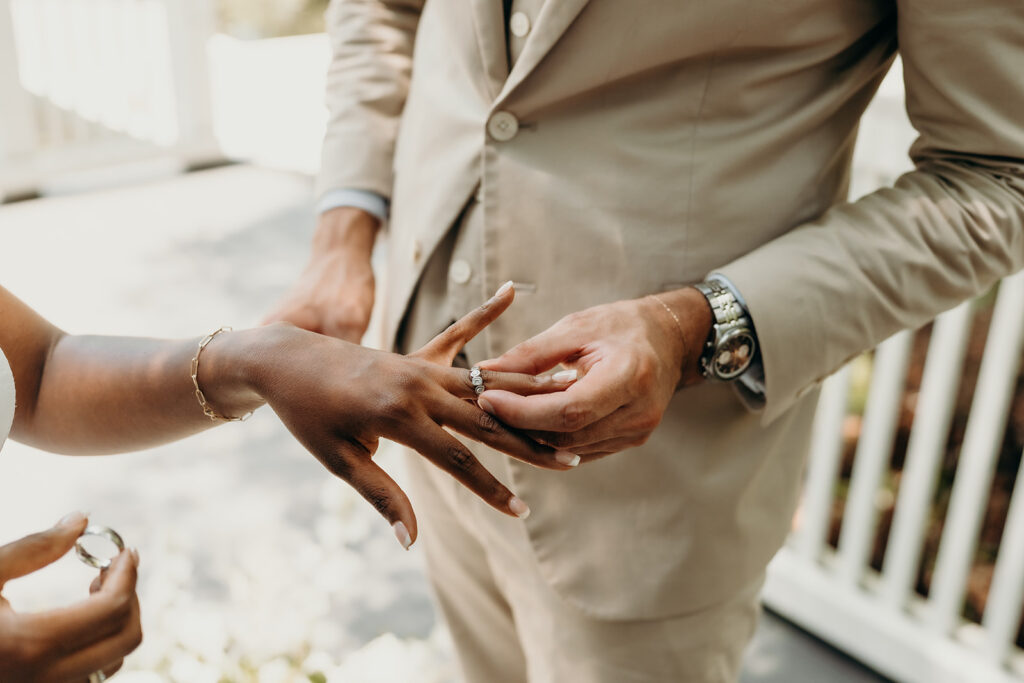 Romantic Elopement at Cypress Gardens - Ceremony by the dock exchanging rings