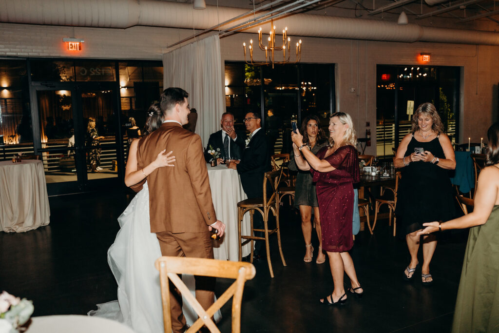 reception and party with dancing, toasts, and cake cutting