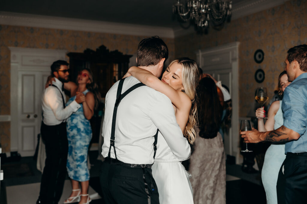 Summer wedding reception dance floor party with dj