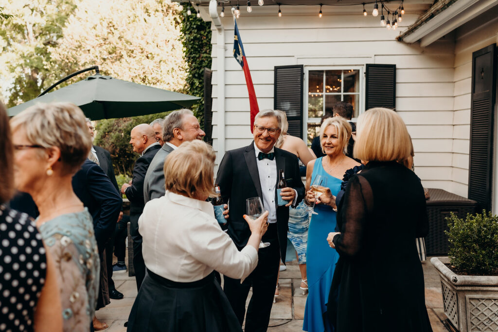 Summer wedding cocktail hour on patio