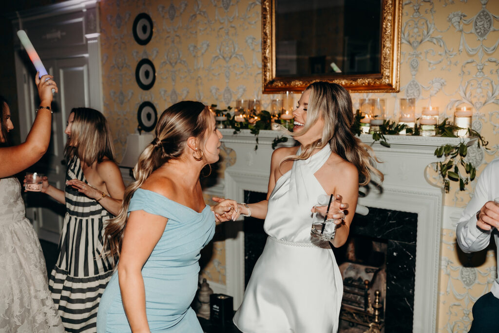 Summer wedding reception dance floor party with dj