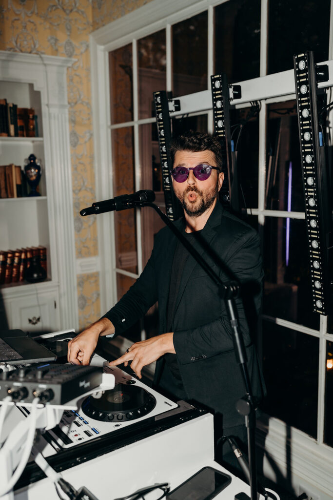 Summer wedding reception dance floor party with dj