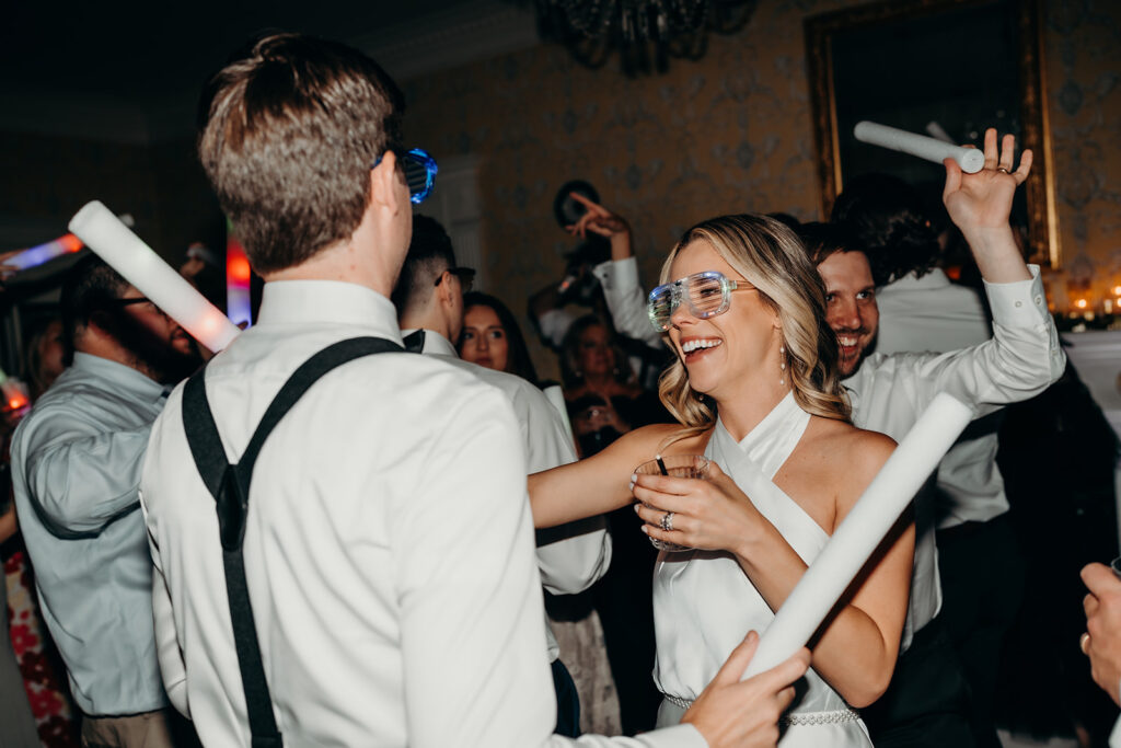 Summer wedding reception dance floor party with dj