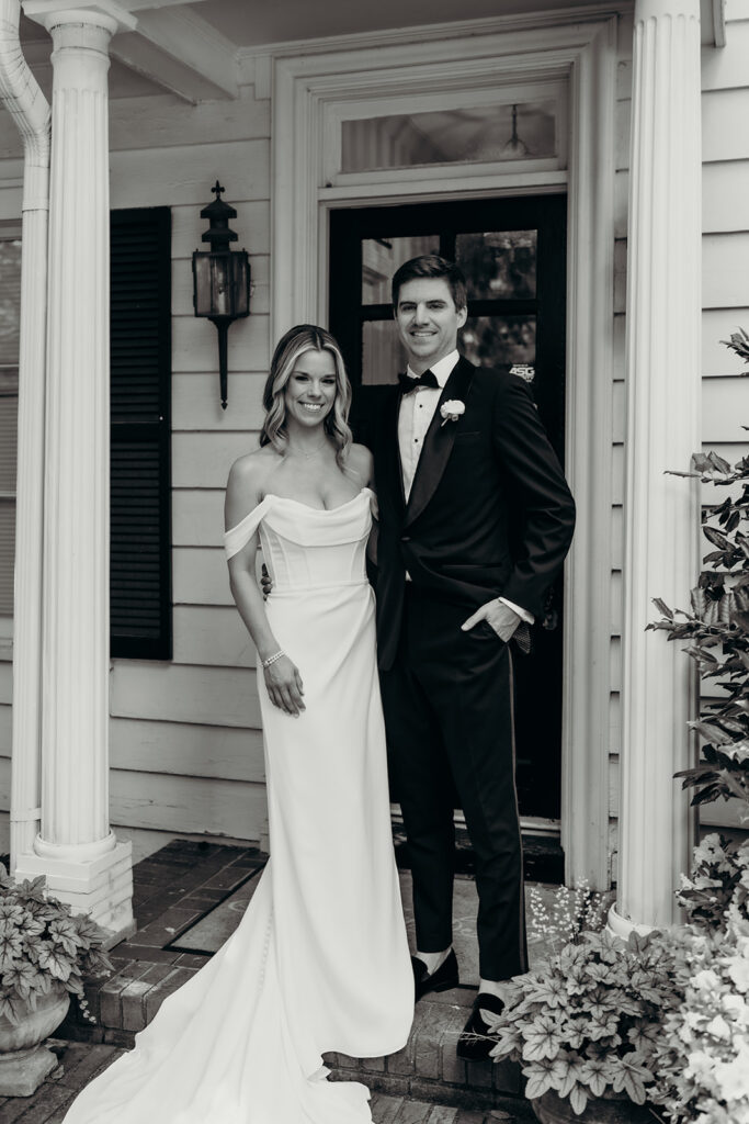 Candid first look portraits in courtyard