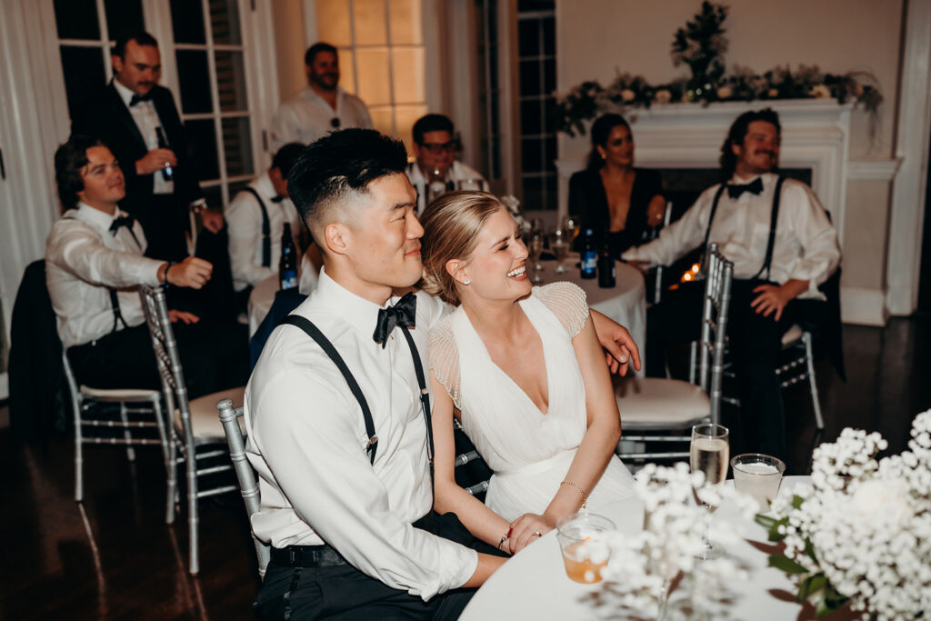 bride and groom during toasts