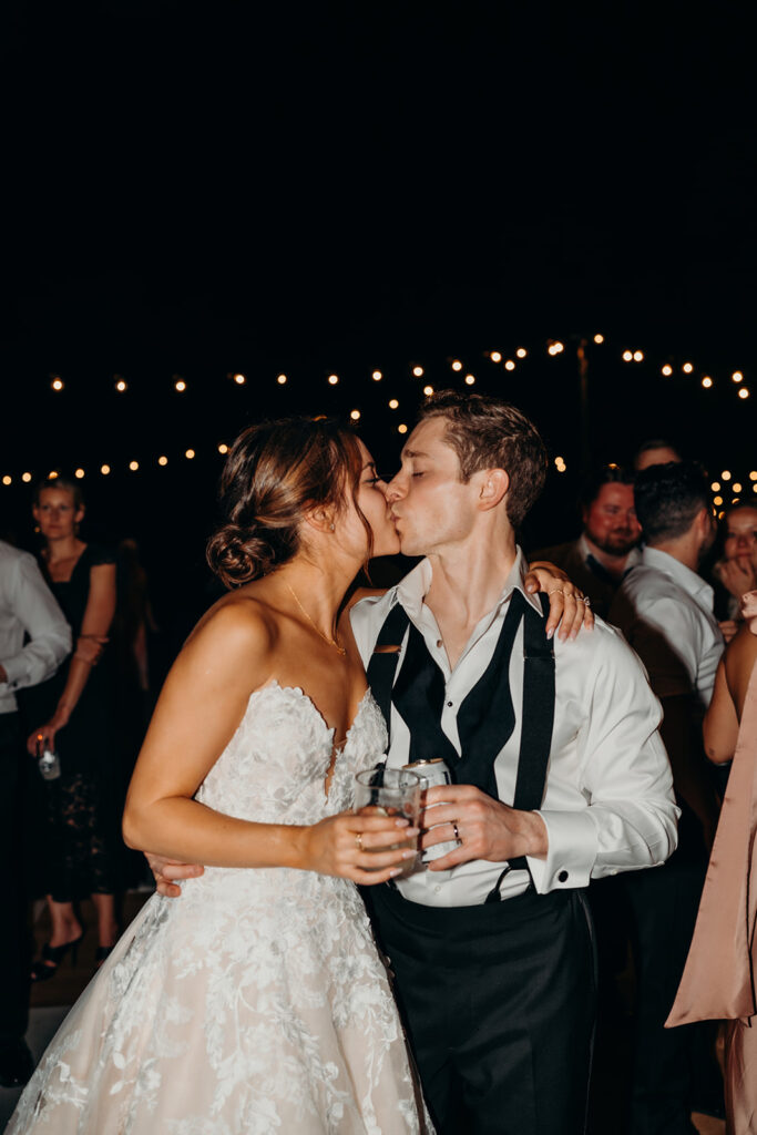 lively energetic dance floor outdoors with market lights and live sax