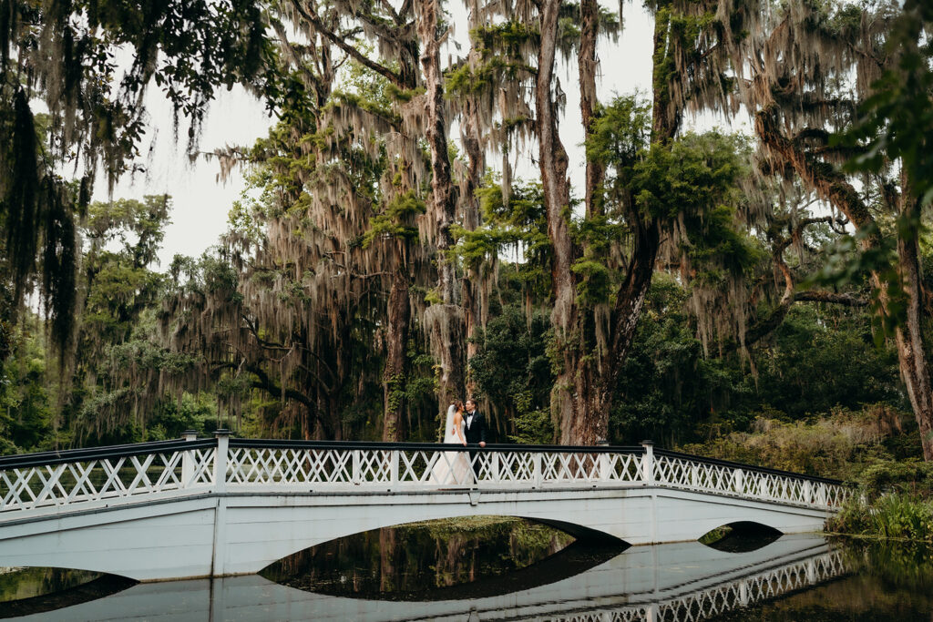 couples portraits around the gardens and under the oak trees