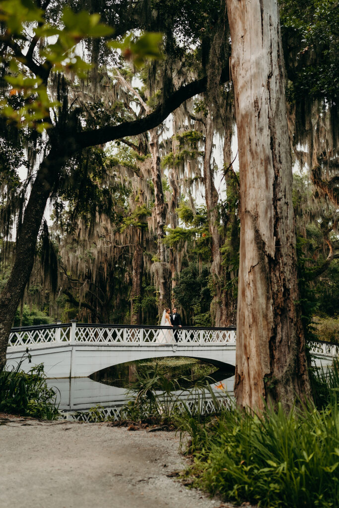 couples portraits around the gardens and under the oak trees