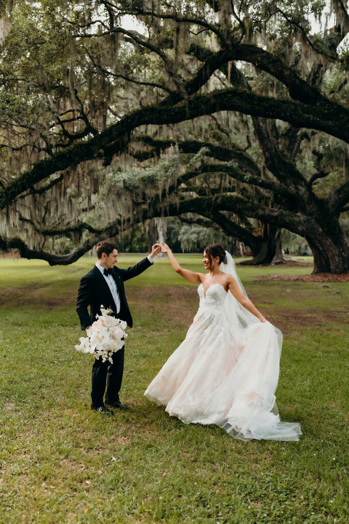 couples portraits around the gardens and under the oak trees