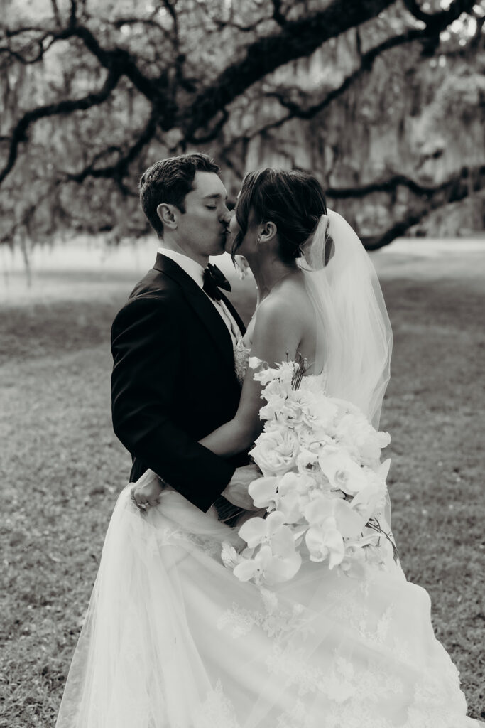 couples portraits around the gardens and under the oak trees