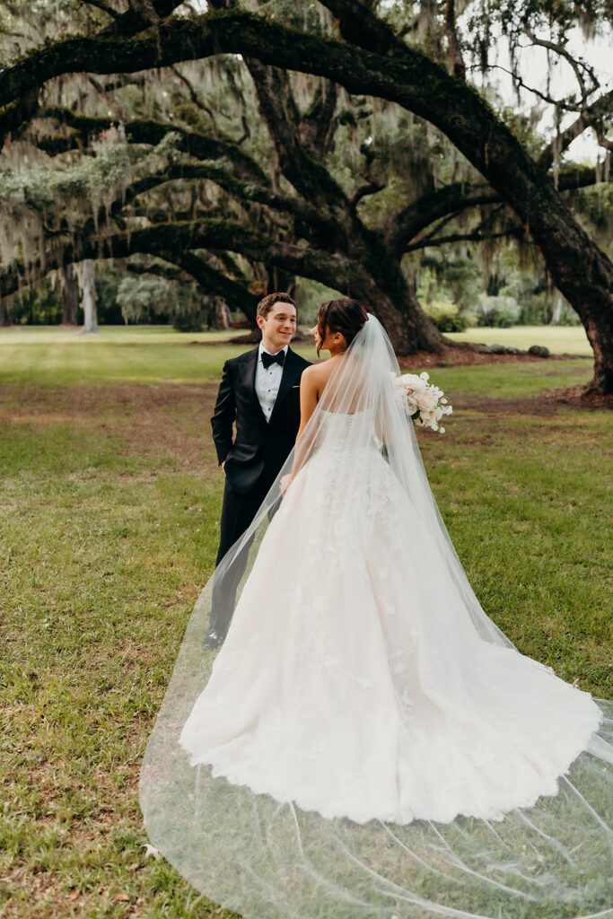 couples portraits around the gardens and under the oak trees