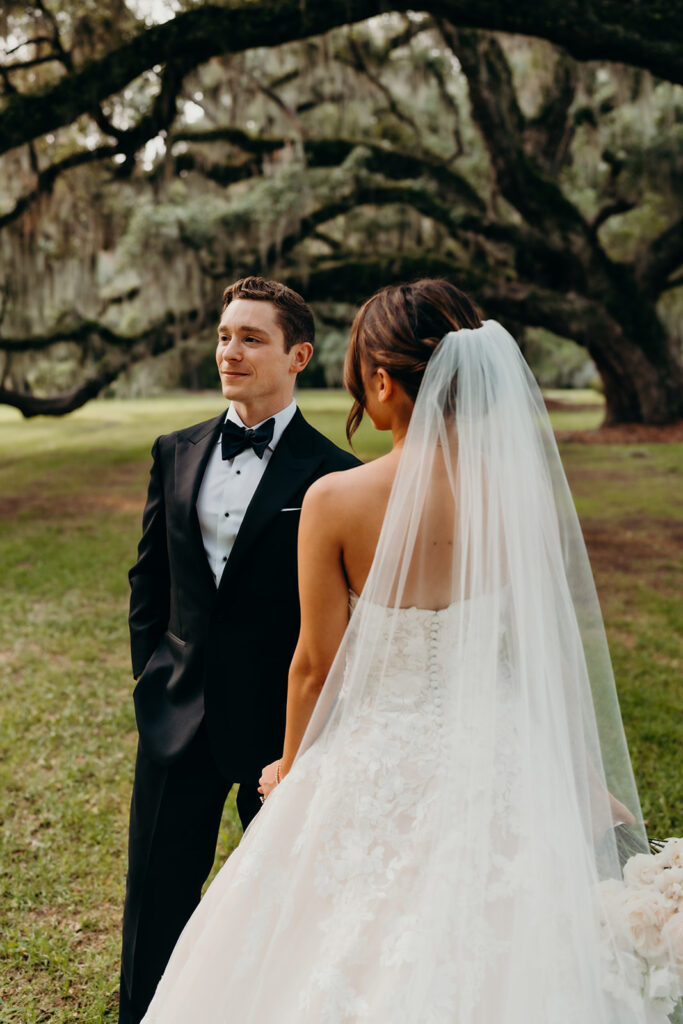 couples portraits around the gardens and under the oak trees