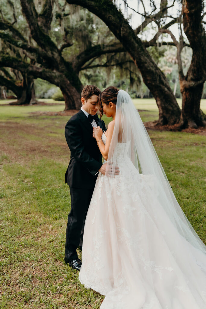 couples portraits around the gardens and under the oak trees