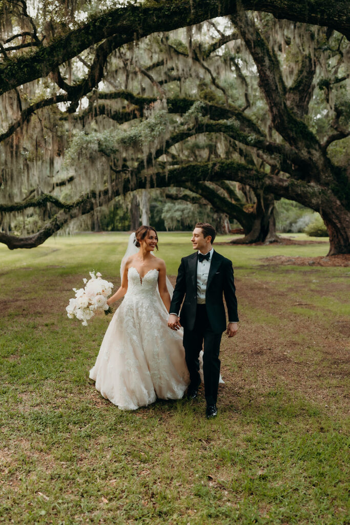 couples portraits around the gardens and under the oak trees