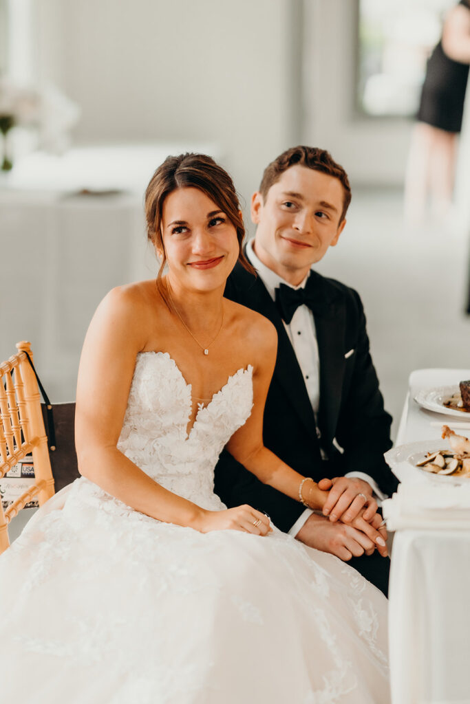 reception outdoors with checkered floor dance floor, happy tears, first dances, and toasts