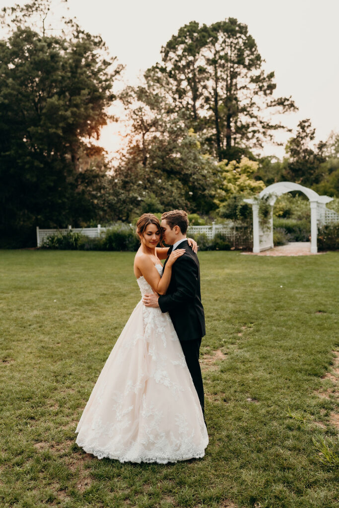 couples portraits around the gardens and under the oak trees