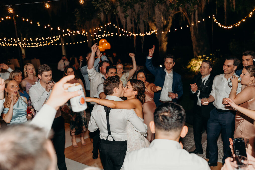 lively energetic dance floor outdoors with market lights and live sax