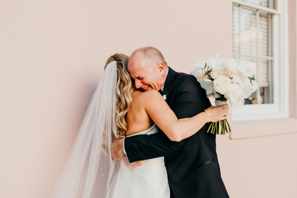 bride and dad first look outside