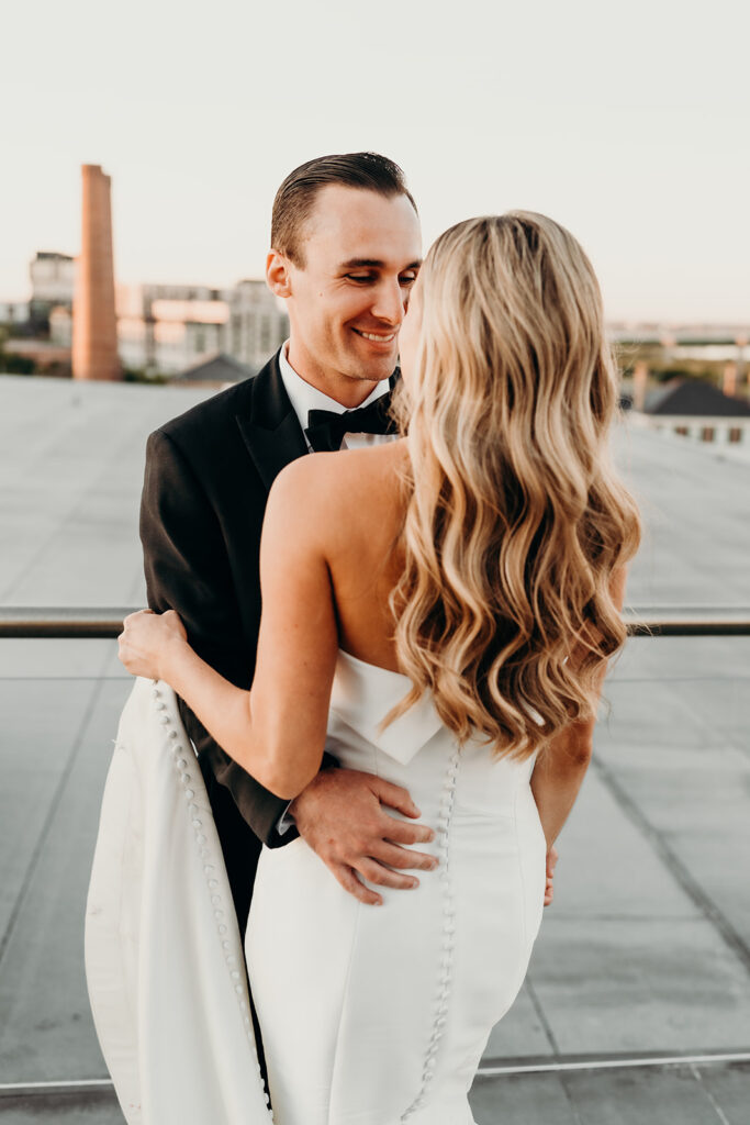 wedding reception at the cedar room couples golden hour portraits on the rooftop