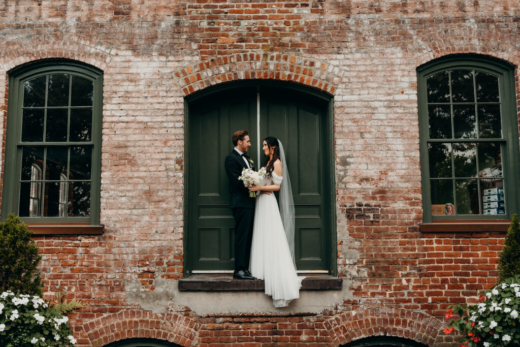 couples portraits outside melrose knitting mill