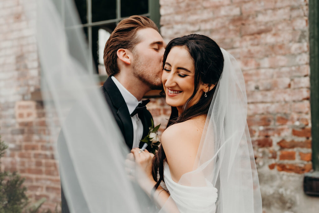 couples portraits outside melrose knitting mill