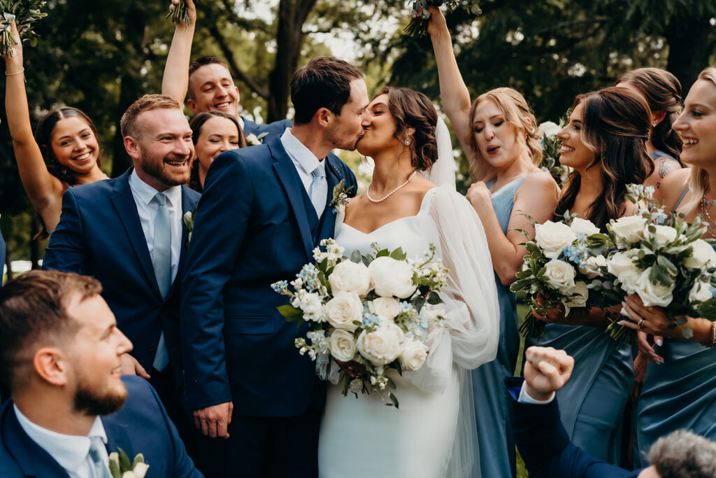 wedding party celebrating the newlyweds at their rose hill estate wedding