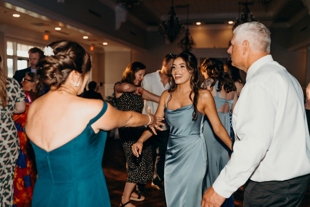 bridesmaid on the dance floor at their rose hill estate wedding