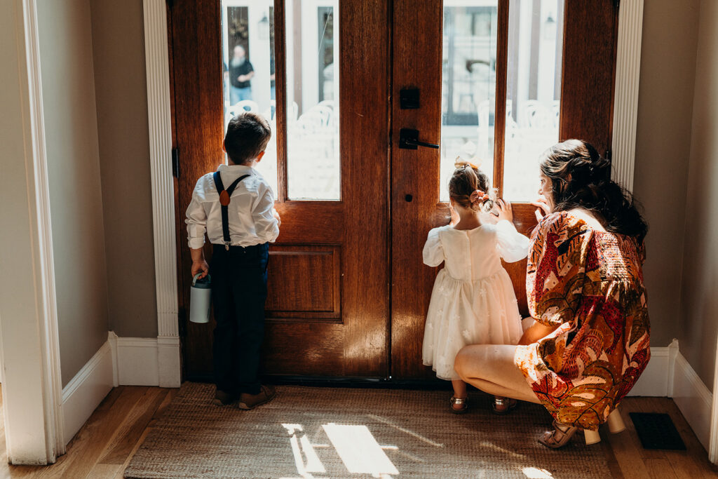 flower girl and ring bearer waiting on ceremony to start
