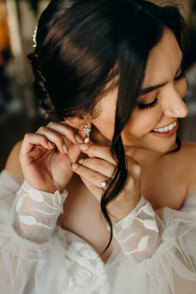 bride getting ready in the upstairs bridal suite