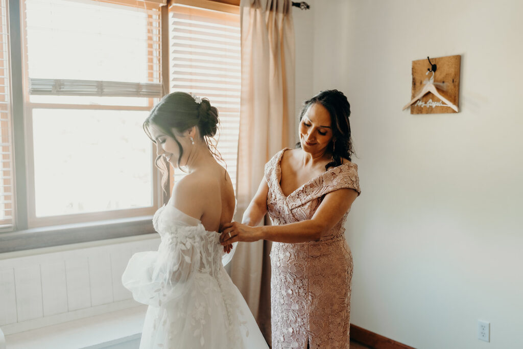 bride getting ready in the upstairs bridal suite