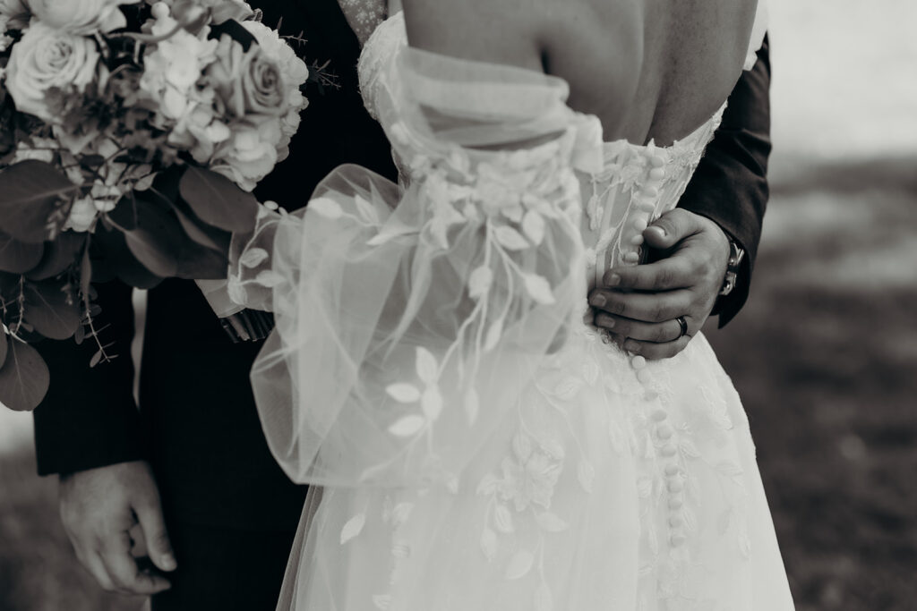 couple's portraits in the front lawn holding each other close