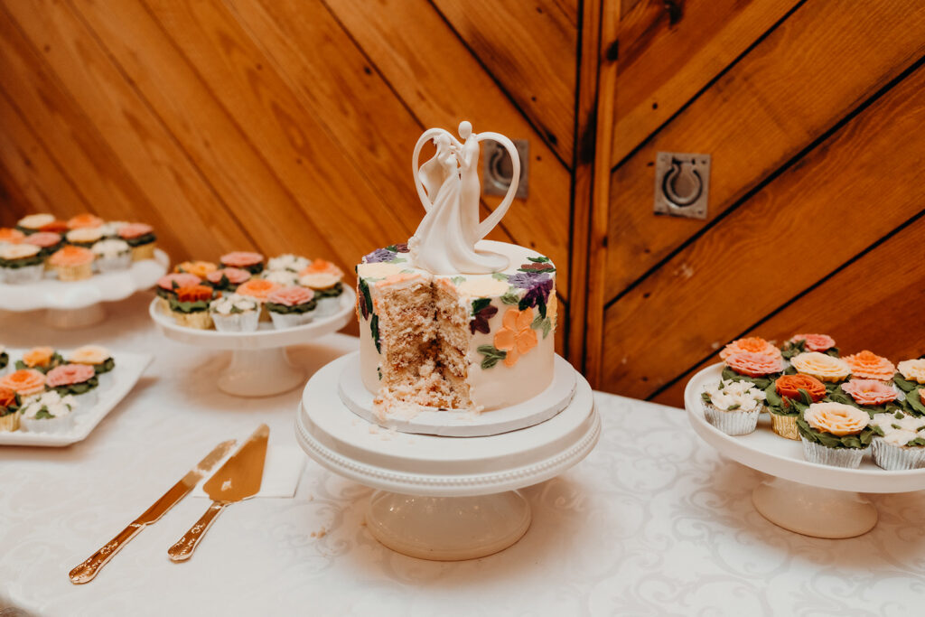couple cake cutting at reception