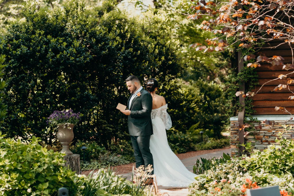 bride and groom private vows beside the barn