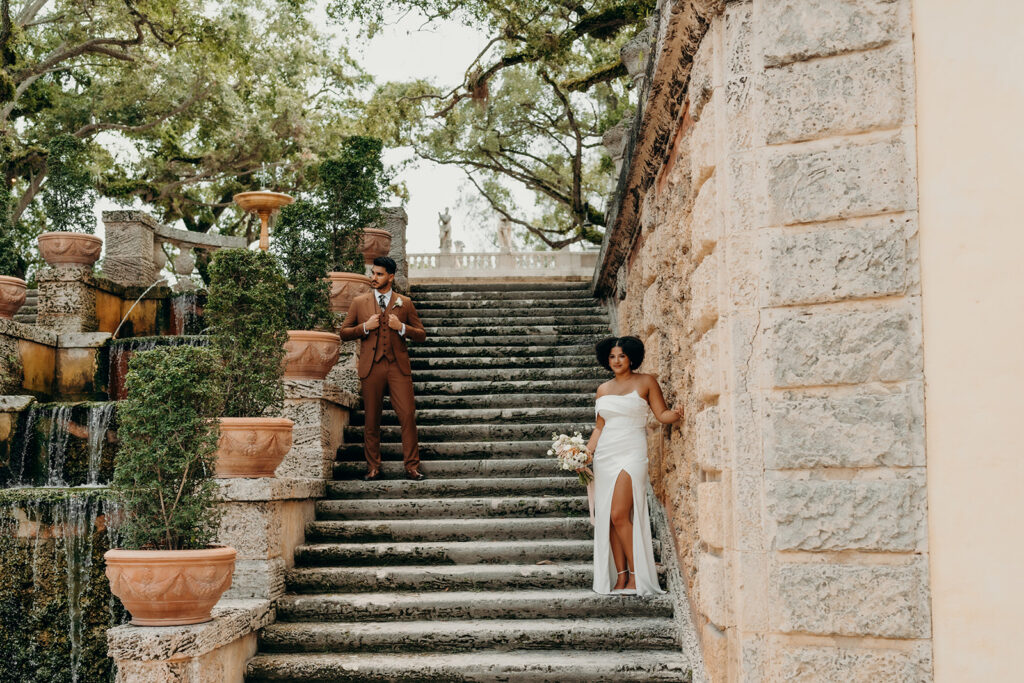 couple posing on stairs