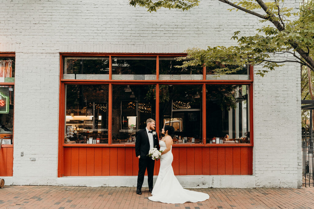 couple sharing a glance after their ceremony
