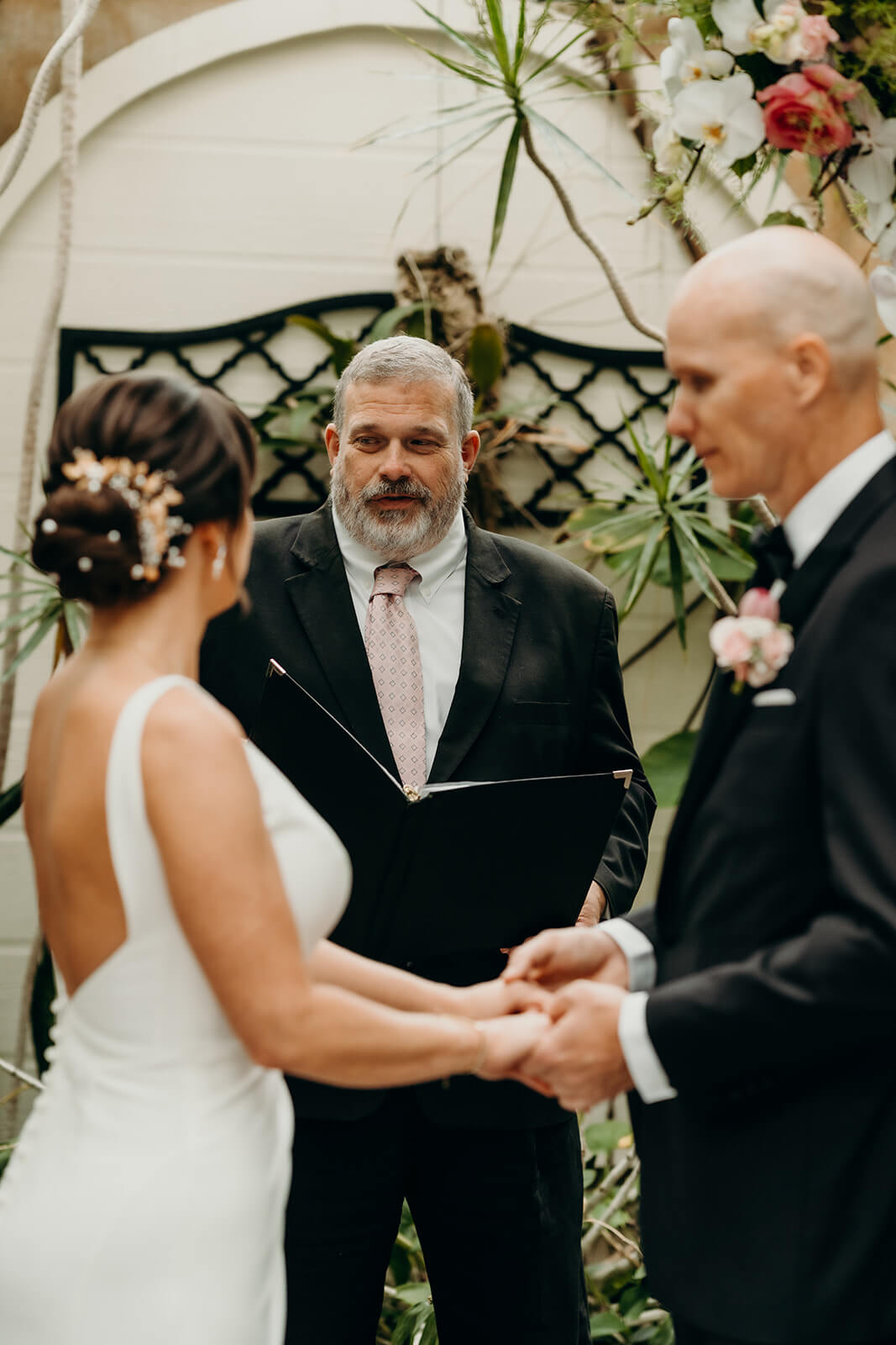 bride and groom saying vows