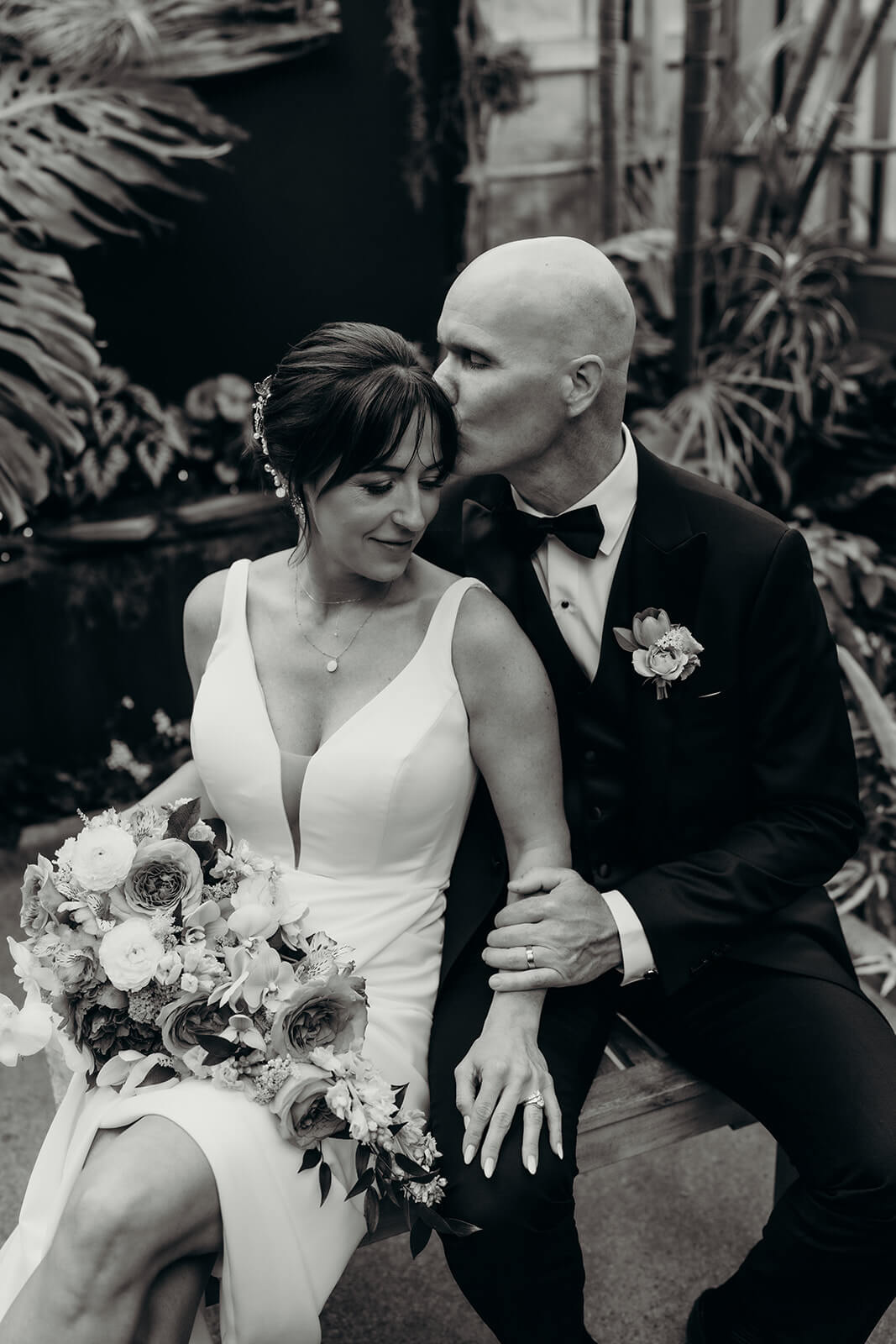 bride and groom couple's portraits bride and groom celebrating with family for a Daniel Stowe Botanical Garden Wedding