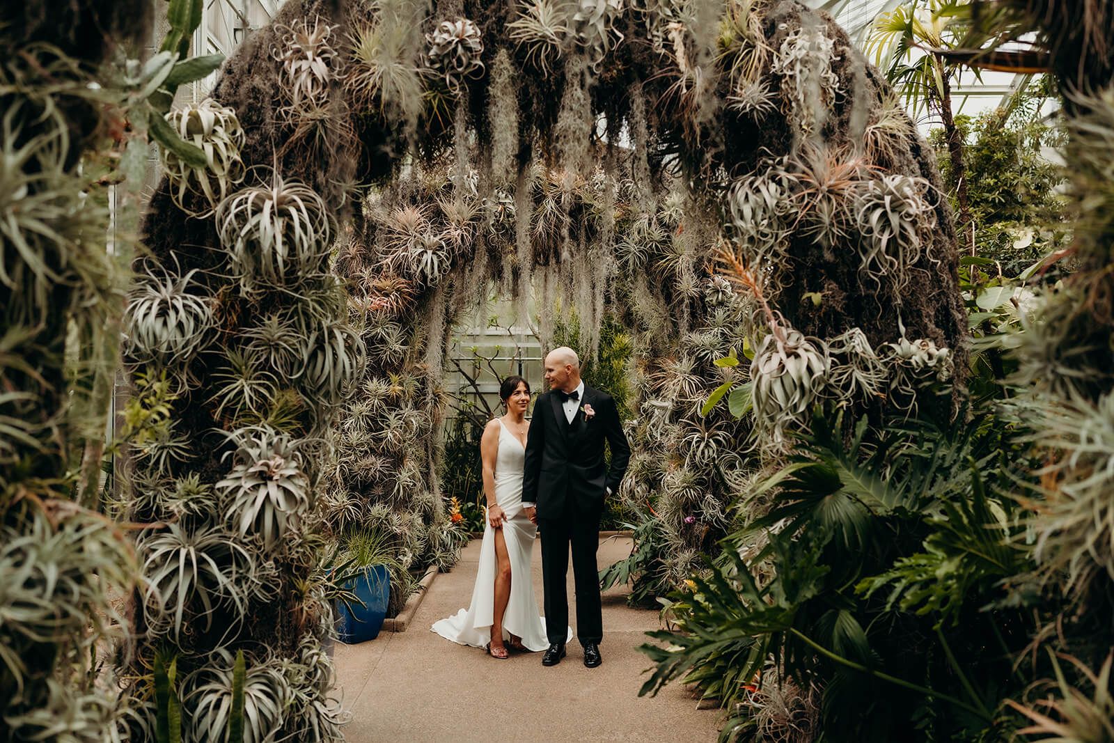 bride and groom couple's portraits bride and groom celebrating with family for a Daniel Stowe Botanical Garden Wedding