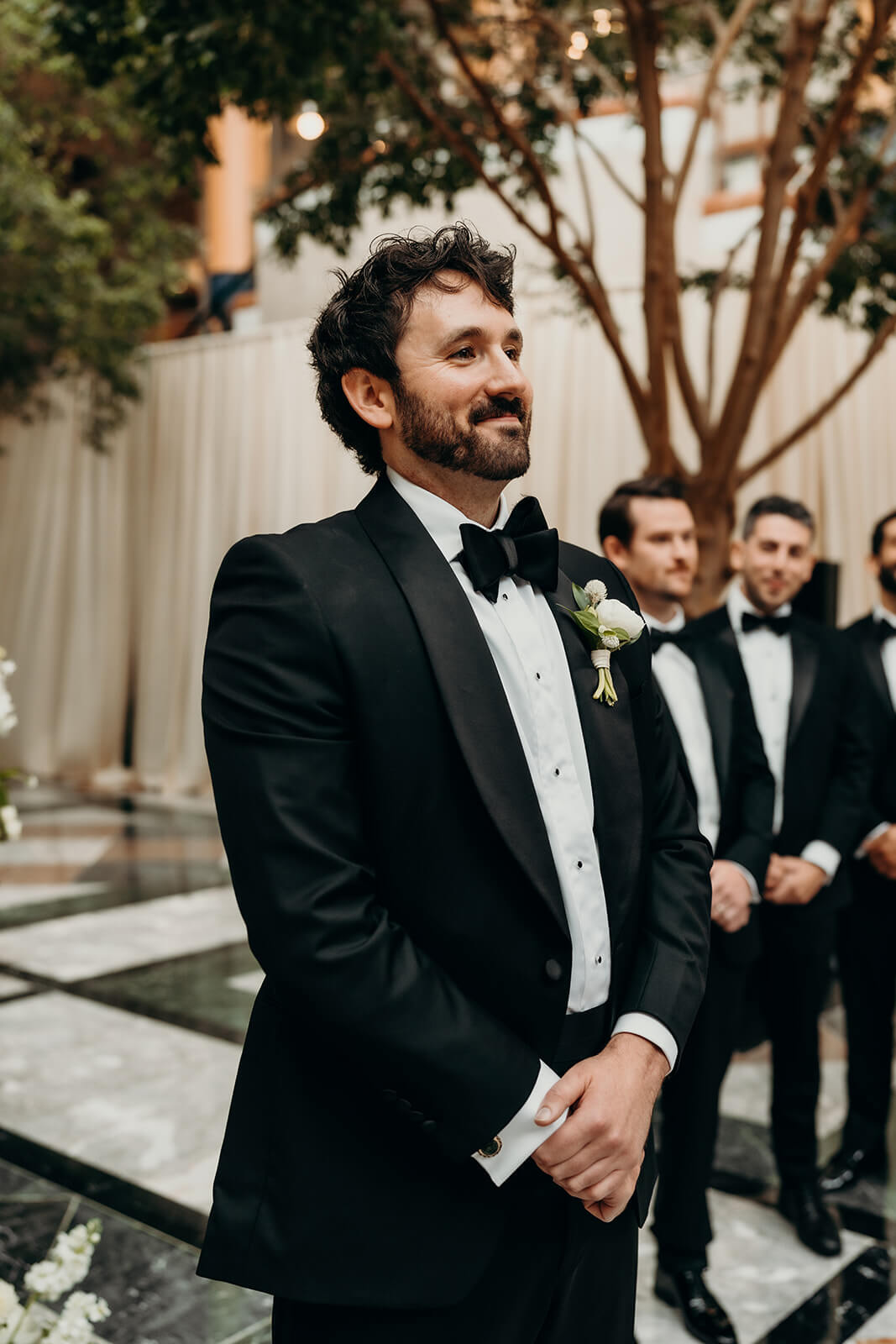 groom seeing his bride at the aisle