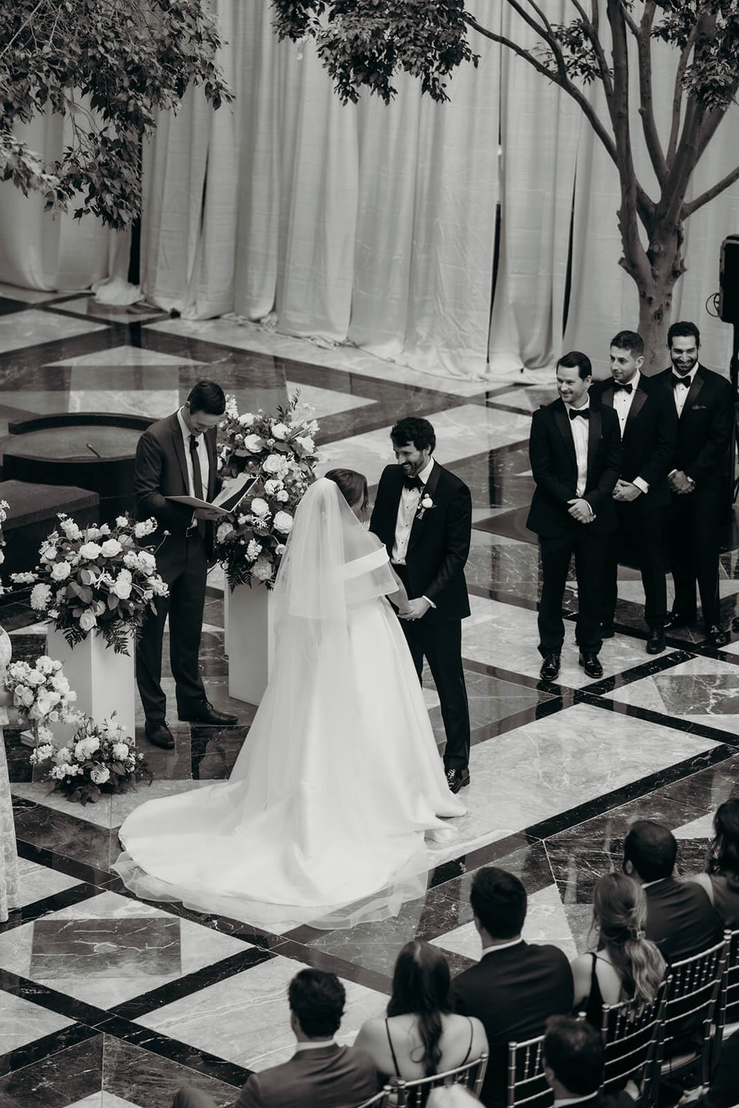 ceremony moment with couple holding hands at Founders Hall Charlotte