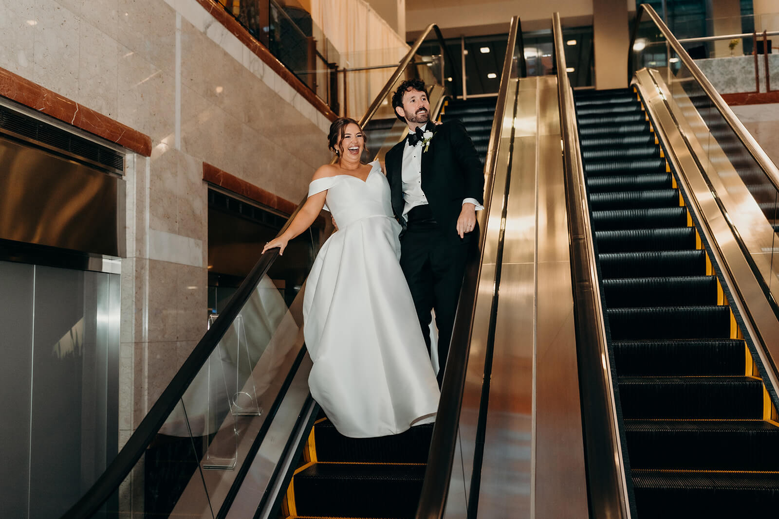 bride and groom entering reception at wedding detail photos of reception at Founders Hall Charlotte