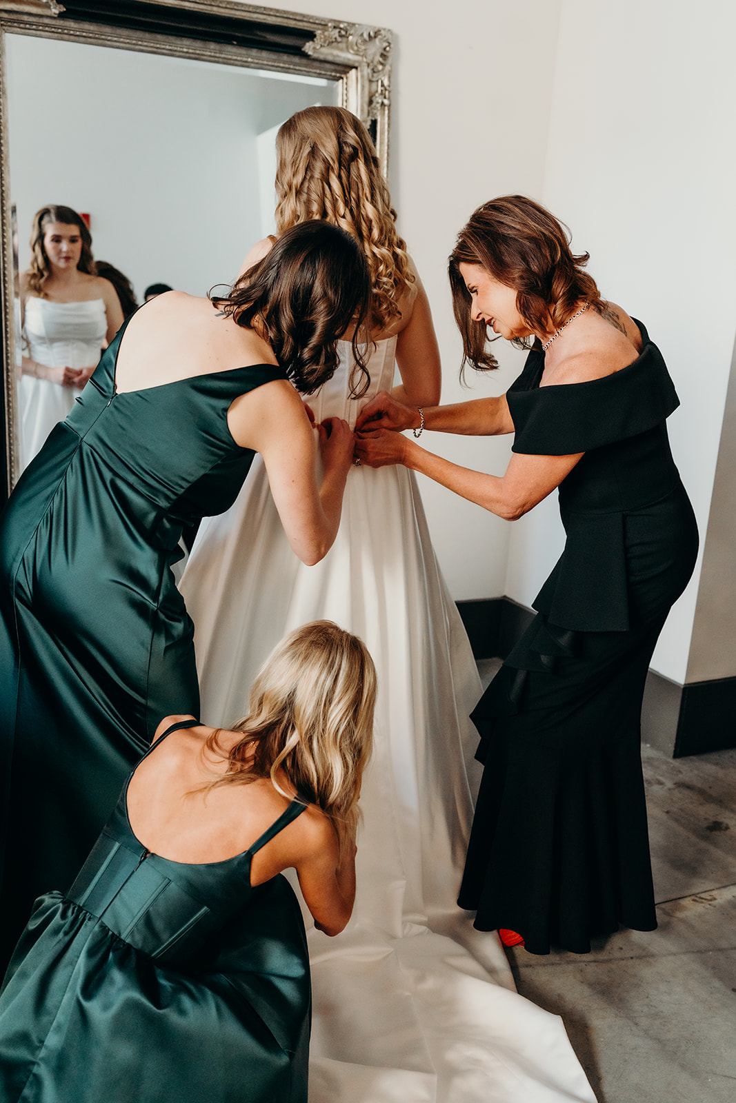 Bride getting ready at Loray Mill Event Hall