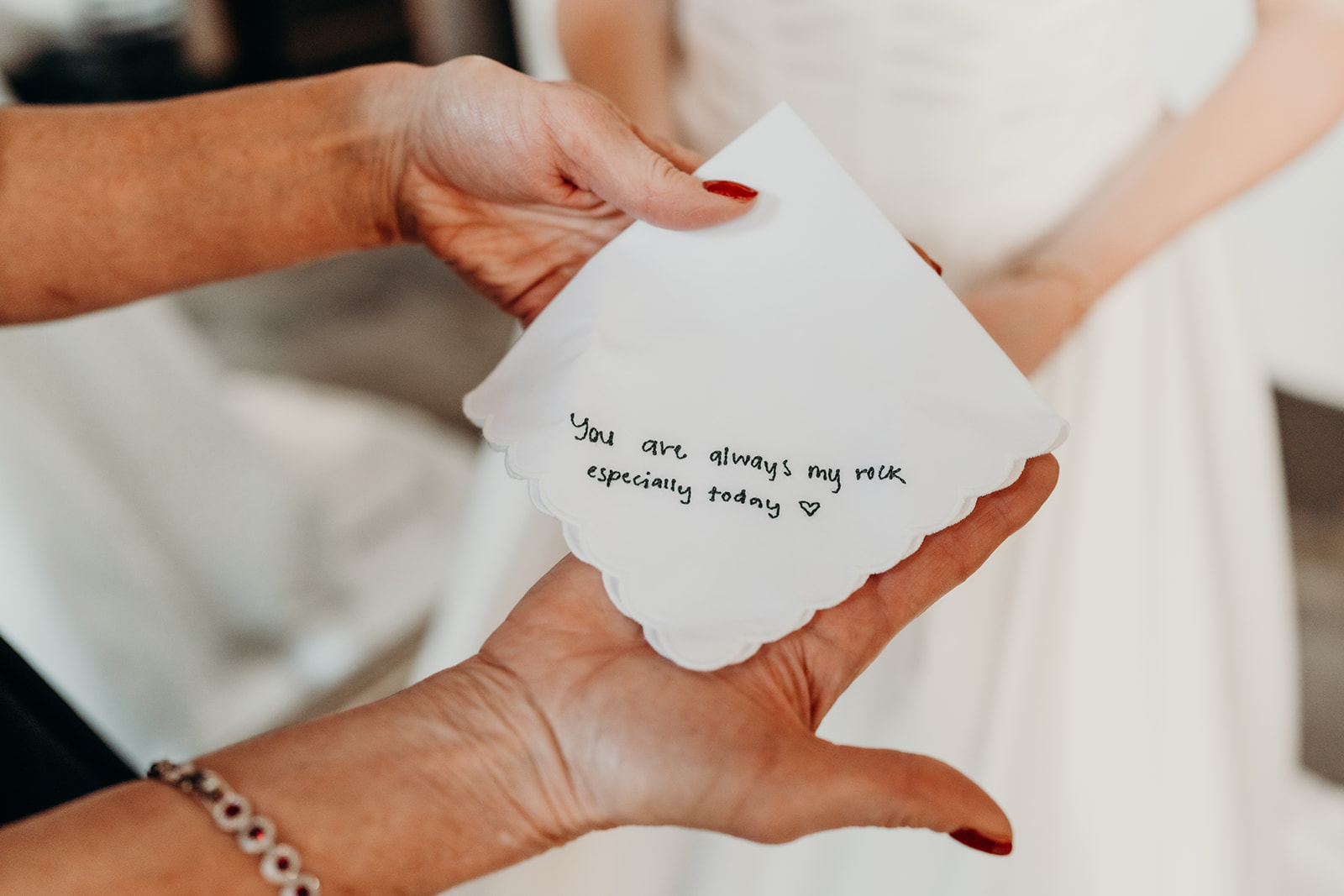 Bride getting ready at Loray Mill Event Hall