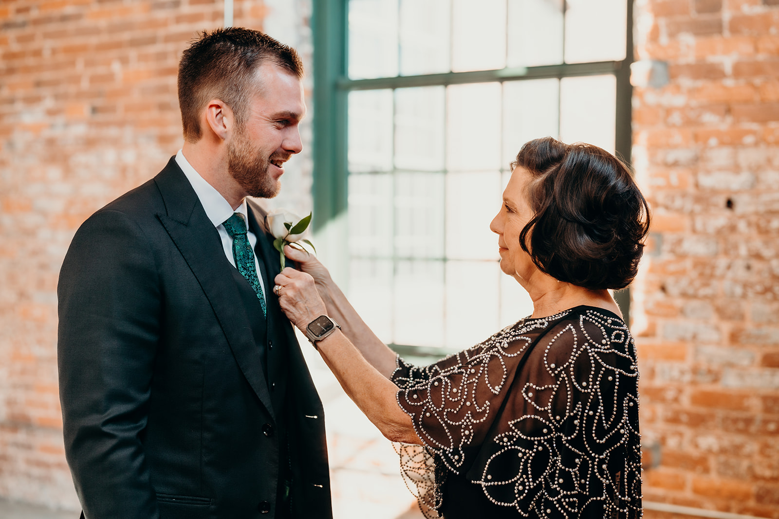 Groom getting ready at Loray Mill Event Hall