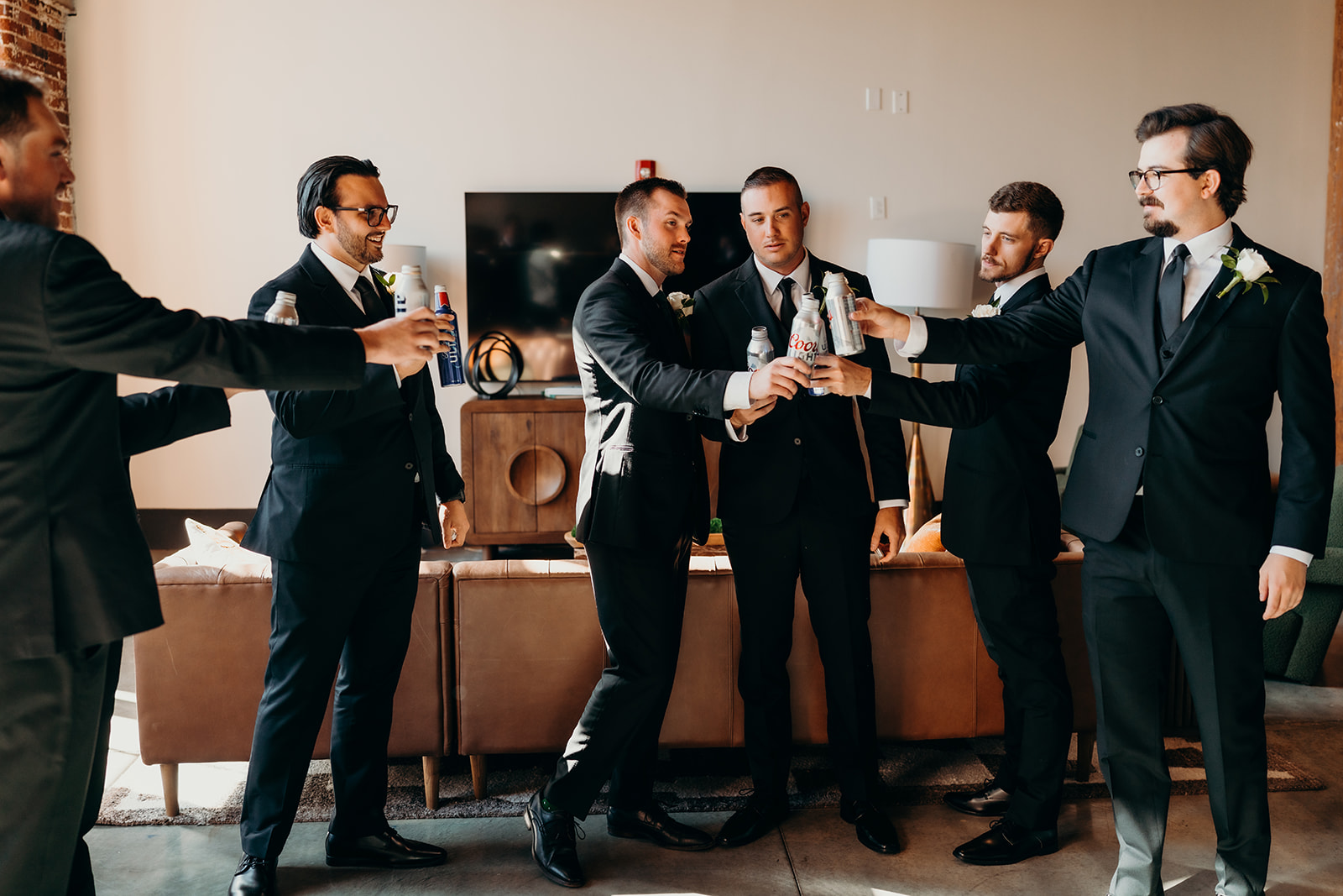 Groom getting ready at Loray Mill Event Hall