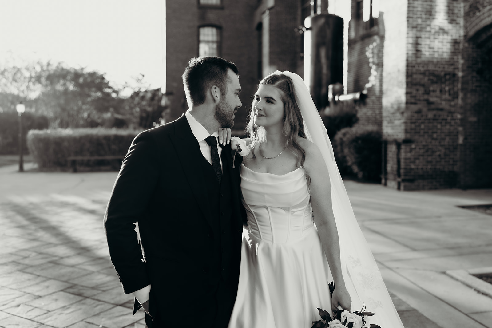 couple's portraits at Loray Mill event hall