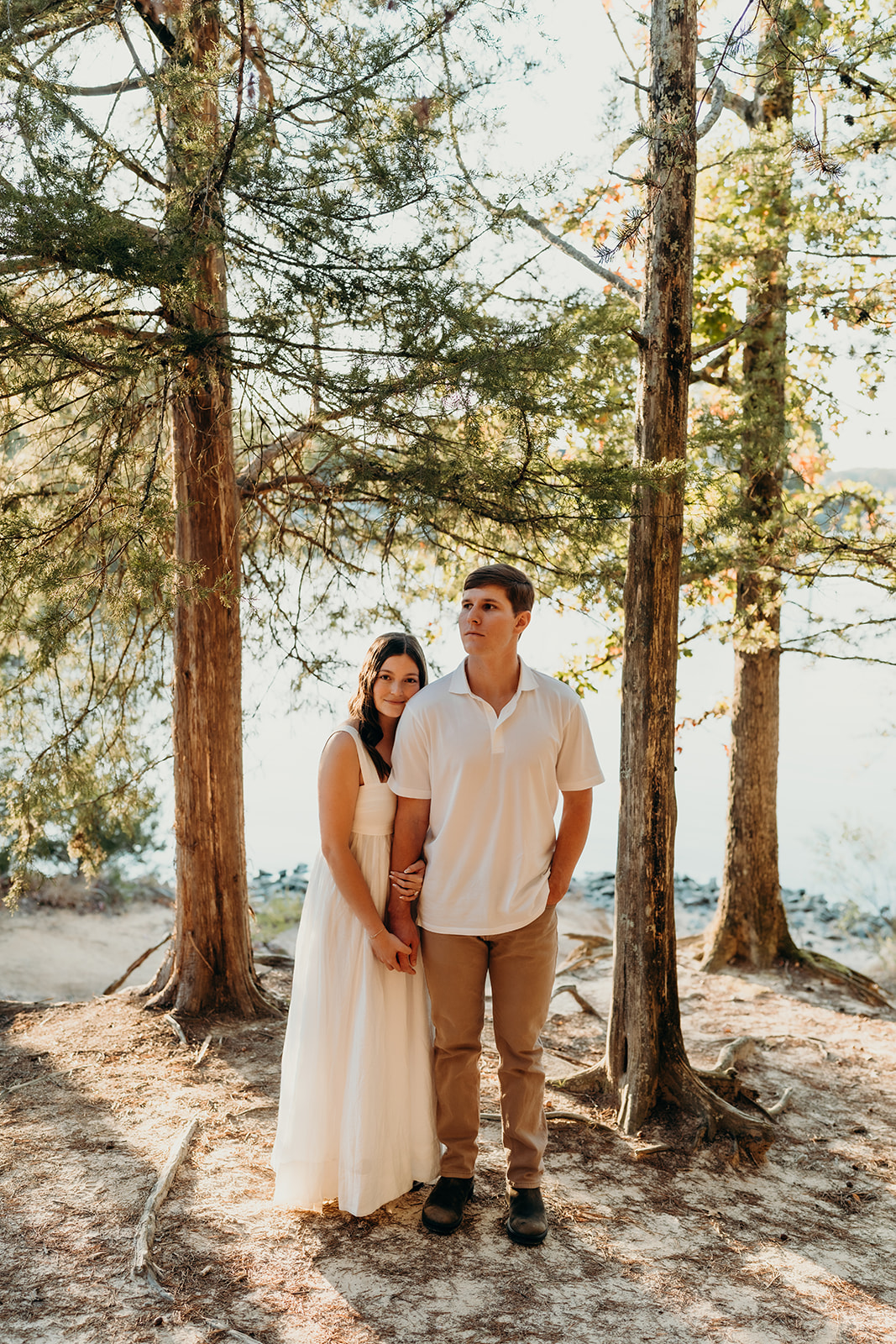 couple in the woods at golden hour at McDowell Nature Preserve Photos